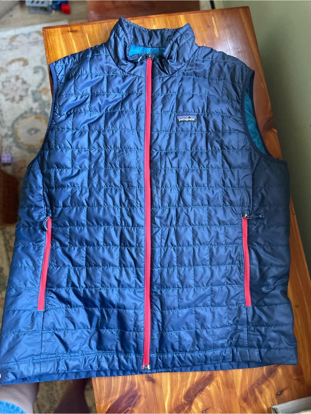 Patagonia men’s nano puff Navy Quilted Vest with red Accents